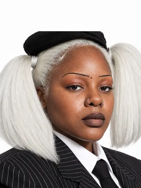 AI character in a black beret and pinstripe suit